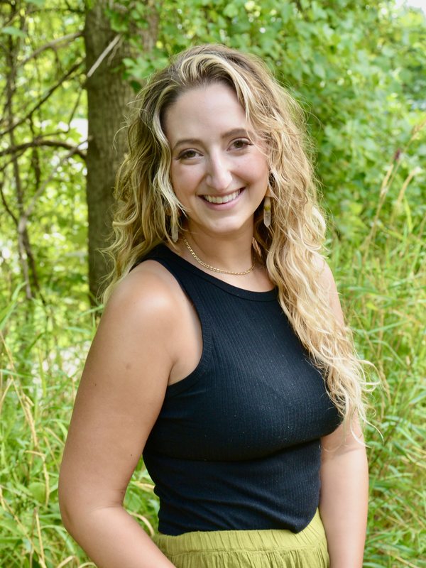 Sarah Ahrens outdoors in greenery